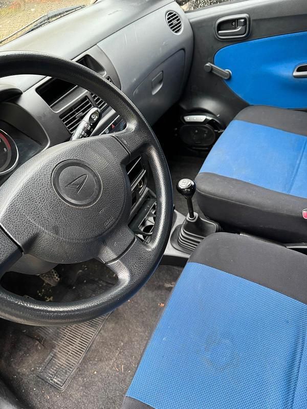 Schwarz Gebraucht 2005 Daihatsu Cuore Kleinwagen | 490 € (Fairer Preis) - Bild 1/4