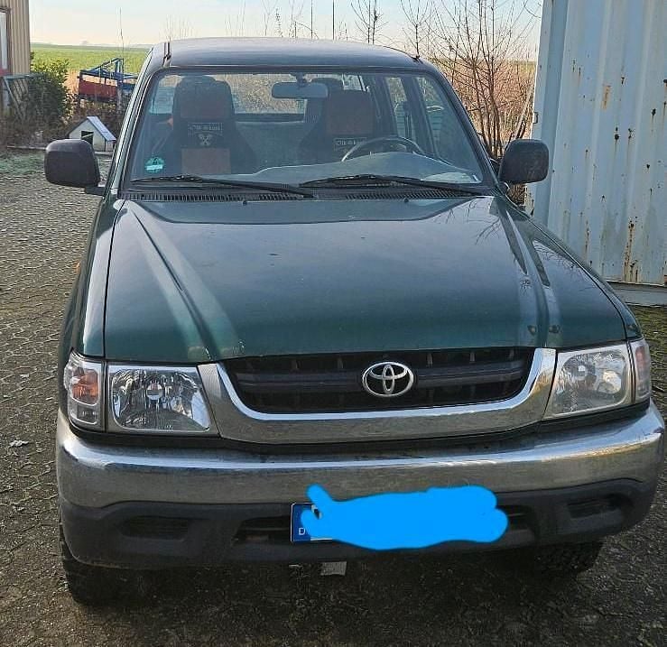 Grün Gebraucht 2005 Toyota HiLux Abholung | 5.800 € (Superpreis) - Bild 1/4