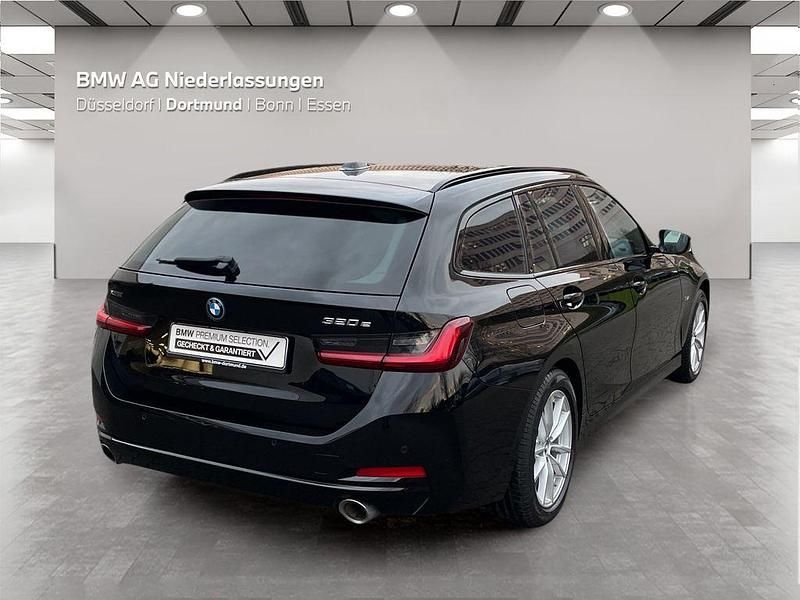 Gebraucht BMW 320e 204 PS (150 kW) 2022 Schwarz Kombi