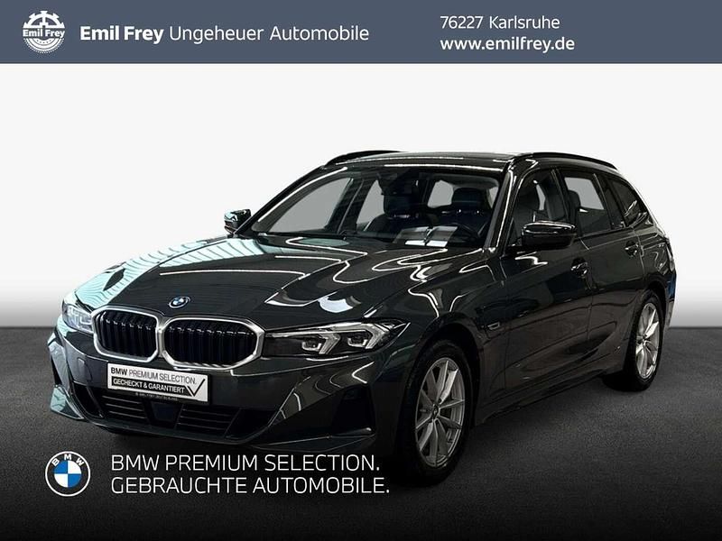 Grau Gebraucht 2022 BMW 320e Sport Line Kombi | 28.990 € (Fairer Preis) - Bild 1/3