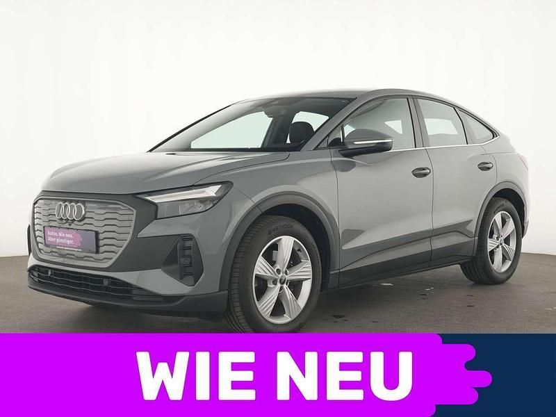 Kieselgrau Gebraucht 2023 Audi Q4 Sportback e-tron Comfort SUV | 31.195 € (Etwas zu teuer) - Bild 1/4