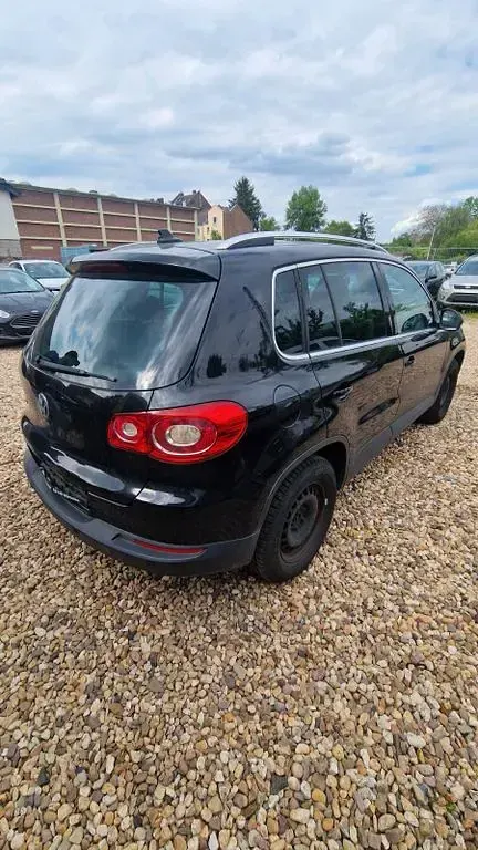 Second-hand VW Tiguan Team 136 CP (100 kW) 2011 Negru SUV