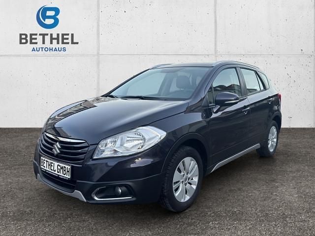 Amethyst gray pearl metallic (metallic) Gebraucht 2014 Suzuki SX4 Comfort Limousine | 12.490 € (Teuer) - Bild 1/4
