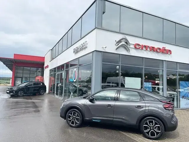 Gebraucht Citroën e-C4 Feel 100 kW (136 PS) 2024 Platiniumgrau metallic Limousine