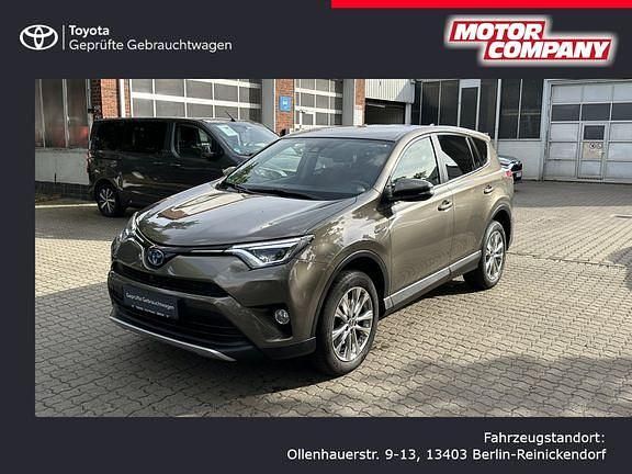 Bronzebraun mica metallic Gebraucht 2016 Toyota RAV4 Hybrid Plus SUV | 20.990 € (Fairer Preis) - Bild 1/4