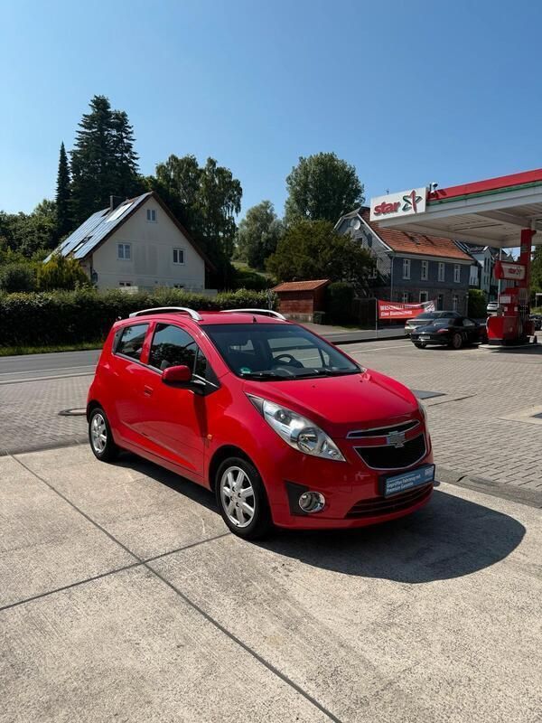 Rot Gebraucht 2011 Chevrolet Spark Kleinwagen | 2.950 € - Bild 1/4