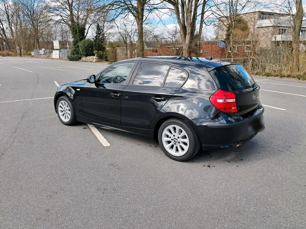 Second-hand BMW 116 116 CP (85 kW) 2011 Negru Hatchback