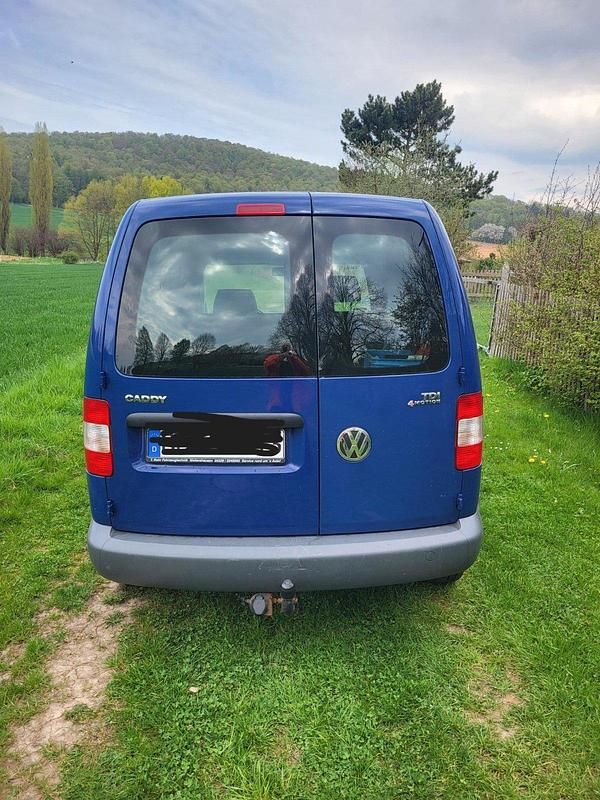 Second-hand VW Caddy 101 CP (74 kW) 2009 Albastru Monovolum