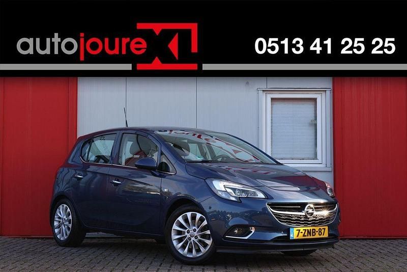 Blau Gebraucht 2015 Opel Corsa Cosmo Limousine | 4.452 € - Bild 1/4