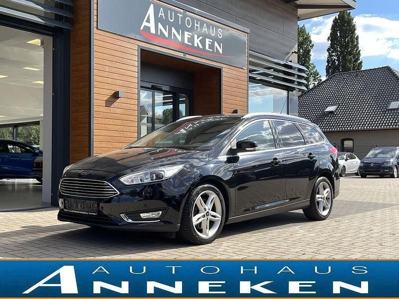Pantherschwarz metallic Gebraucht 2015 Ford Focus Titanium Kombi | 11.450 € (Etwas zu teuer) - Bild 1/4