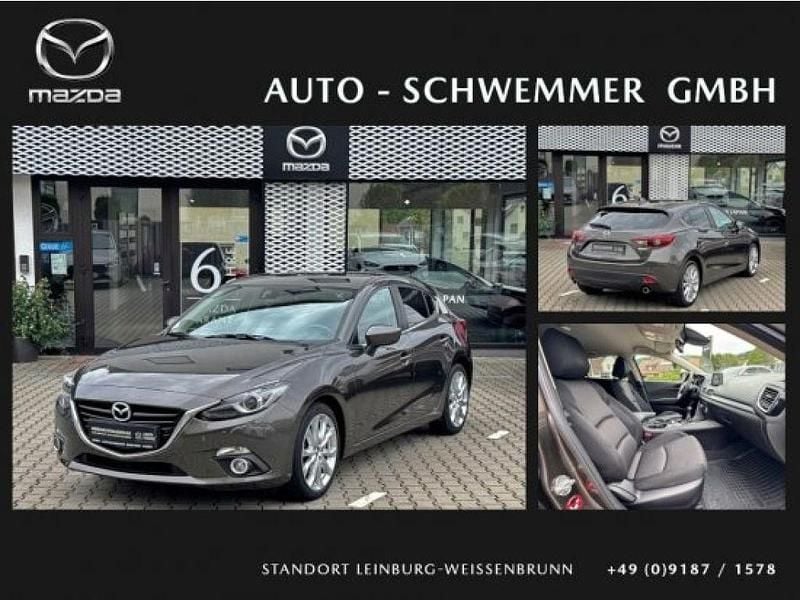 Titanium flash (metallic) Gebraucht 2014 Mazda 3 Sports-Line Limousine | 11.490 € (Fairer Preis) - Bild 1/4