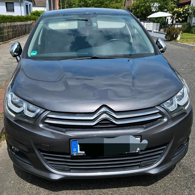 Grau Gebraucht 2015 Citroën C4 PureTech Limousine | 5.999 € (Teuer) - Bild 1/4