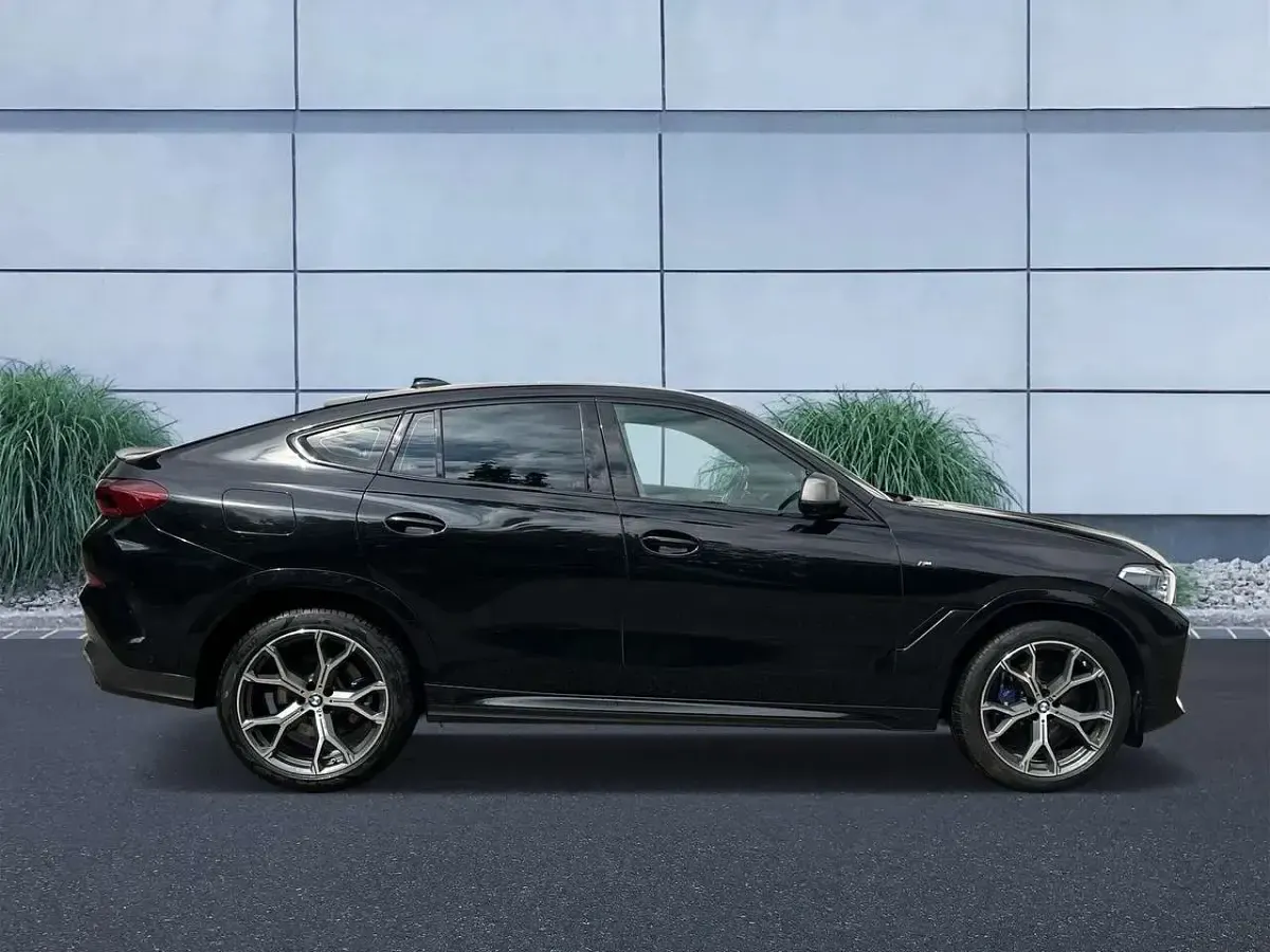 Gebraucht BMW X6 M50 Shadowline 400 PS (294 kW) 2020 Saphirschwarz metallic SUV