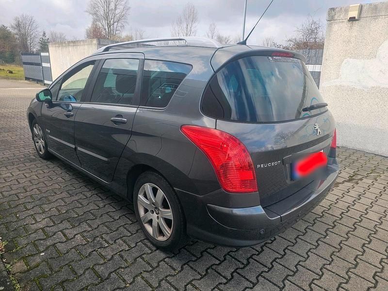Gebraucht Peugeot 308 114 PS (83 kW) 2013 Grau Kombi