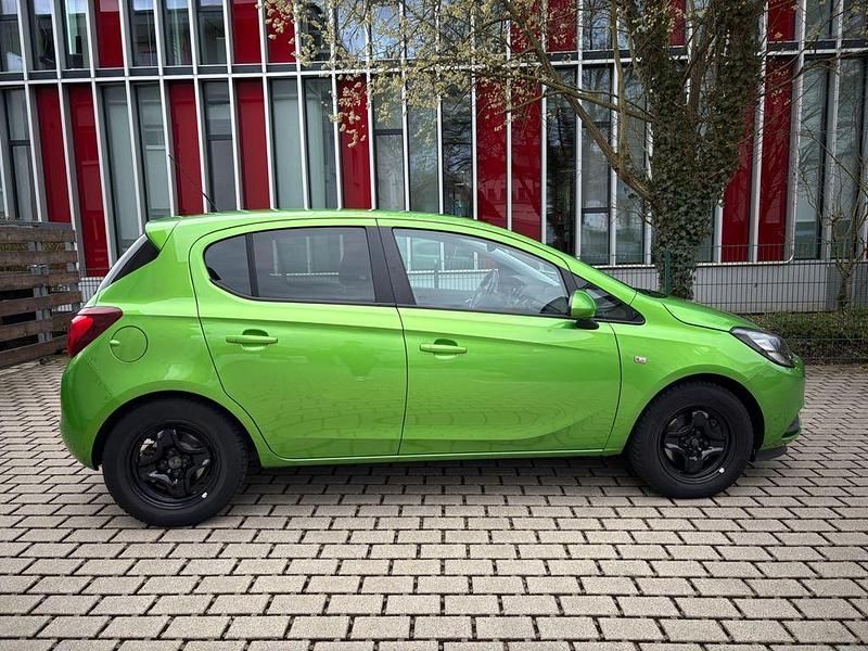 Gebraucht Opel Corsa Active 90 PS (66 kW) 2015 Grün Kleinwagen
