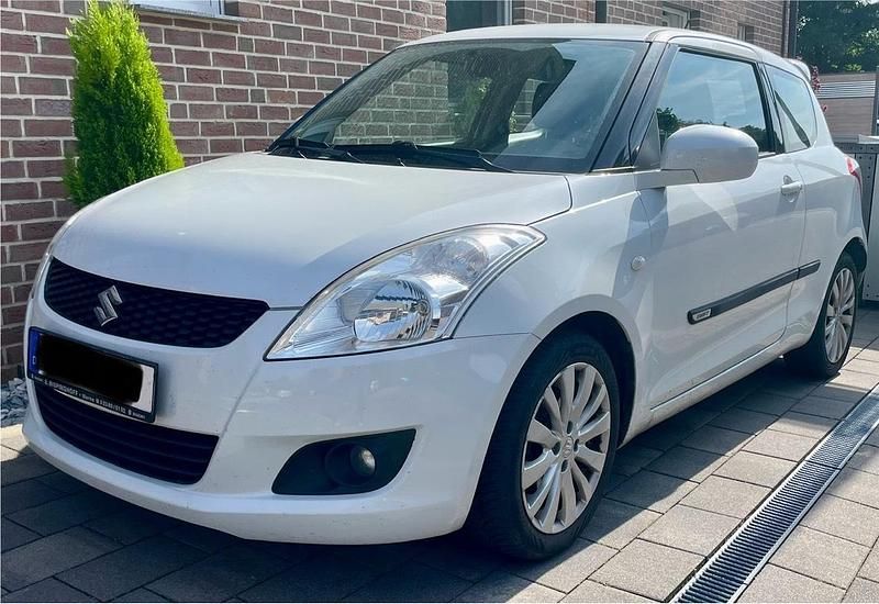 Weiß Gebraucht 2013 Suzuki Swift Kleinwagen | 5.900 € (Etwas zu teuer) - Bild 1/4