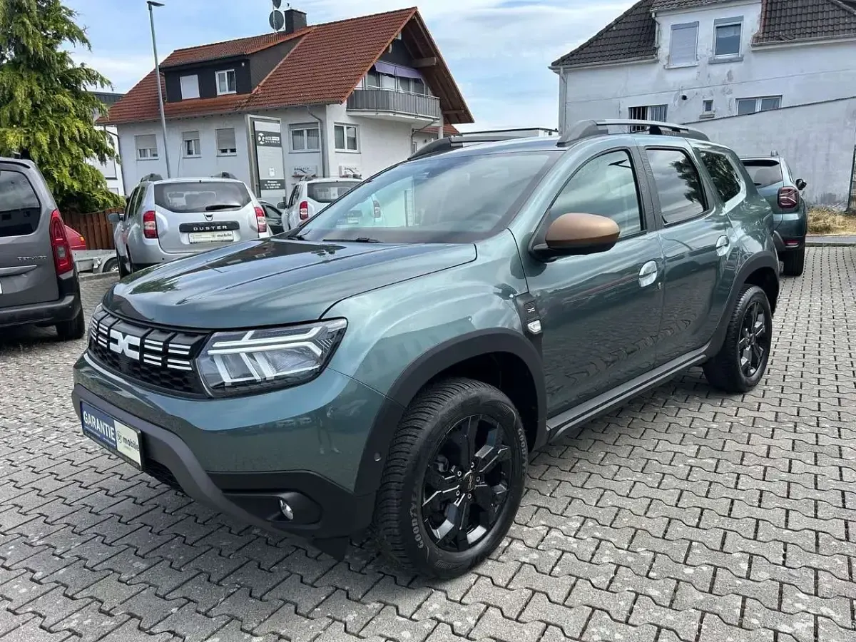 Gebraucht Dacia Duster Extreme 114 PS (83 kW) 2024 Zedergrün SUV