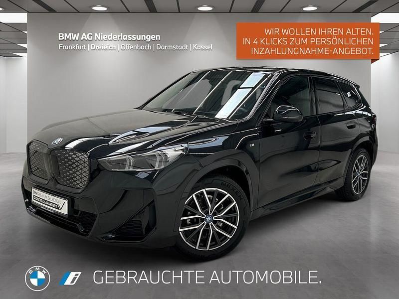 Schwarz Gebraucht 2024 BMW iX1 Luxury Line SUV | 43.690 € (Etwas zu teuer) - Bild 1/4