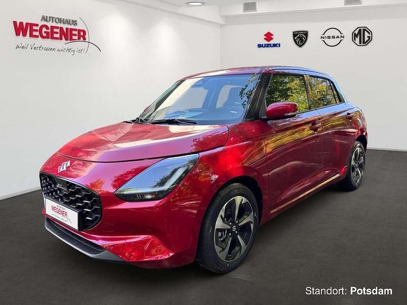Burning red pearl metallic Gebraucht 2025 Suzuki Swift Comfort+ Kleinwagen | 22.200 € (Teuer) - Bild 1/4