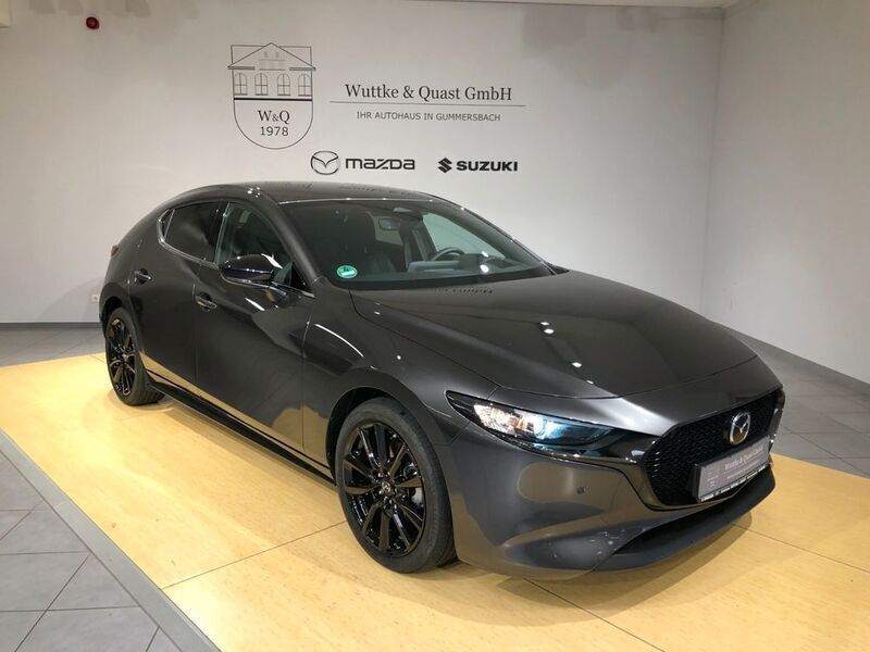 Grau Gebraucht 2024 Mazda 3 Homura-Line Limousine | 24.990 € (Fairer Preis) - Bild 1/4
