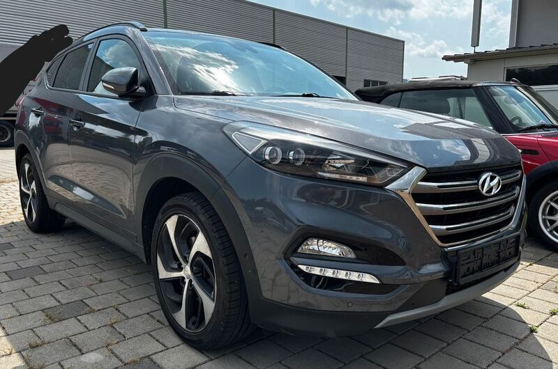 Grau Gebraucht 2018 Hyundai Tucson Passion Plus SUV | 21.900 € (Fairer Preis) - Bild 1/4
