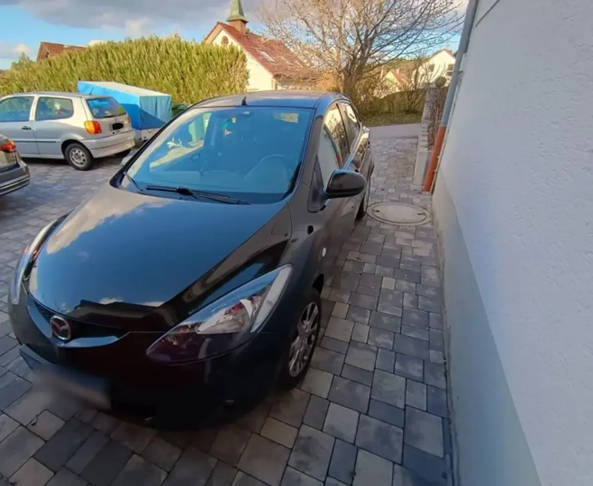 Gebraucht Mazda 2 75 PS (55 kW) 2010 Schwarz Kleinwagen