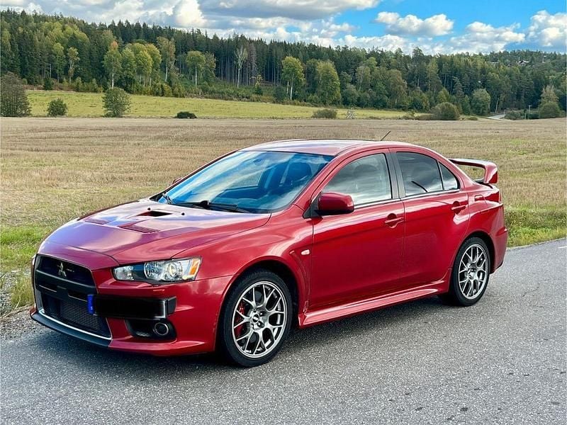 Rot Gebraucht 2013 Mitsubishi Lancer Limousine | 33.000 € (Teuer) - Bild 1/4