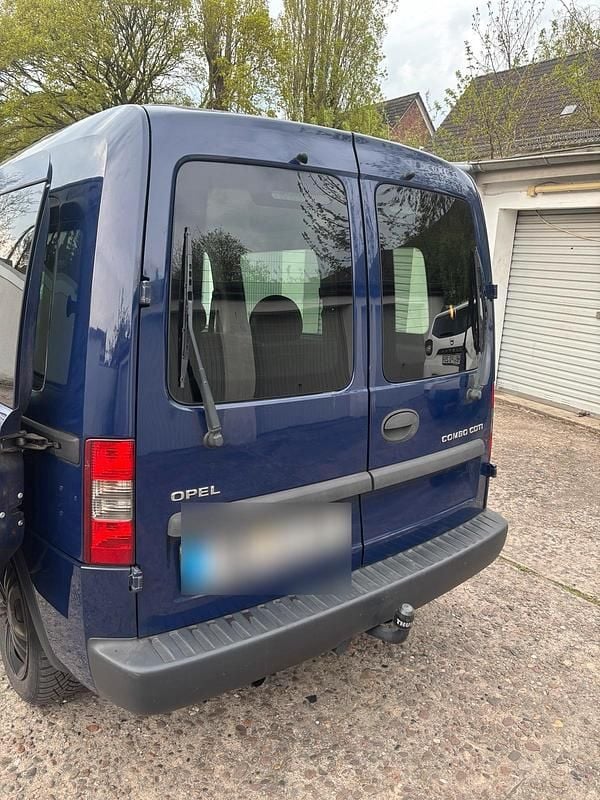Używany Opel Combo 90 KM (66 kW) 2011 Niebieski Minivan