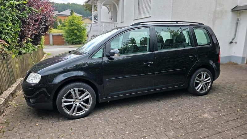 Schwarz Gebraucht 2006 VW Touran Van / Kleinbus | 900 € (Superpreis) - Bild 1/4