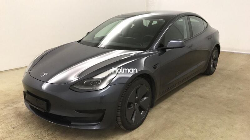 Grau Gebraucht 2021 Tesla Model 3 Standard Range Plus Limousine | 20.218 € (Guter Preis) - Bild 1/4
