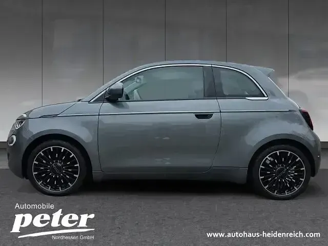 Gebraucht Fiat 500e La Prima 86 kW (118 PS) 2023 Colore esterno (mineral grau) Kleinwagen