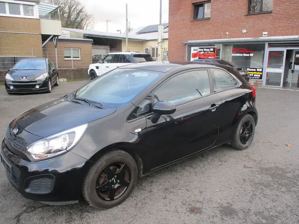Gebraucht Kia Rio Attract 75 PS (55 kW) 2015 Schwarz Limousine