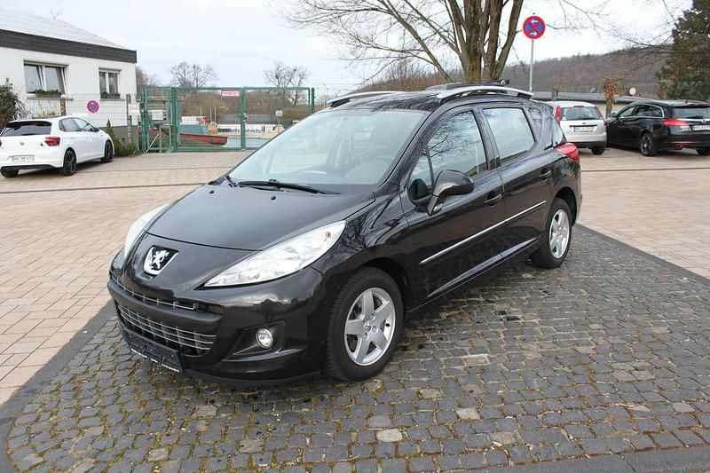 Gebraucht Peugeot 207 Premium 120 PS (88 kW) 2013 Schwarz obsidien/metallic Kombi