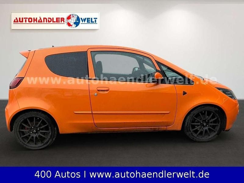 Second-hand Mitsubishi Colt Edition 95 CP (69 kW) 2008 Portocaliu Berlinǎ
