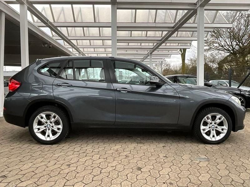 Grau Gebraucht 2014 BMW X1 Sport Line SUV | 7.950 € (Superpreis) - Bild 1/4
