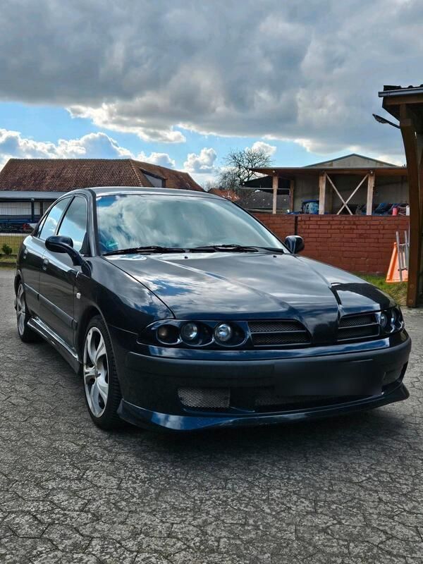 Schwarz Gebraucht 1999 Mitsubishi Carisma Limousine | 850 € - Bild 1/4