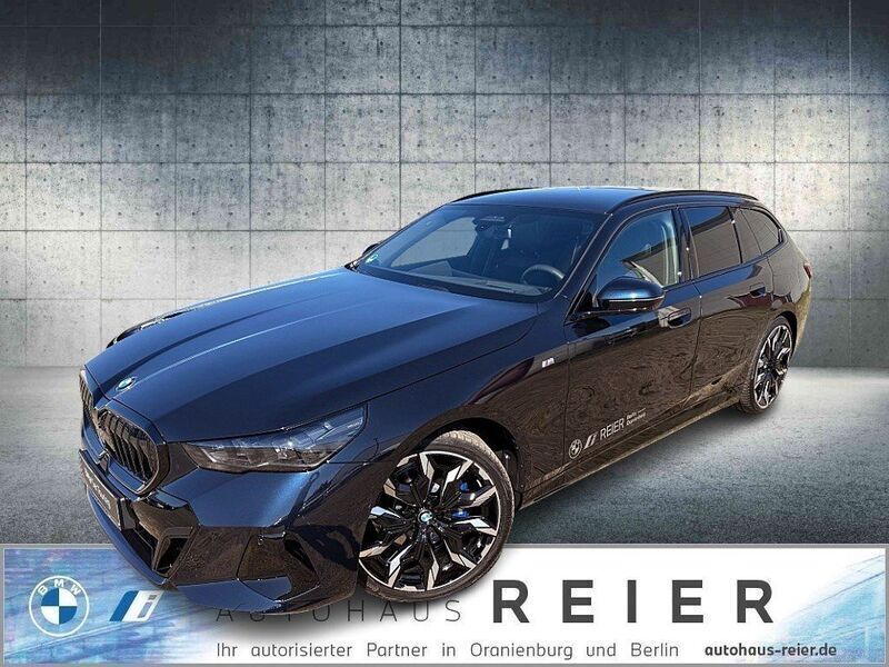 M carbonschwarz metallic Neu 2024 BMW 520 M Sport Kombi | 66.900 € - Bild 1/4