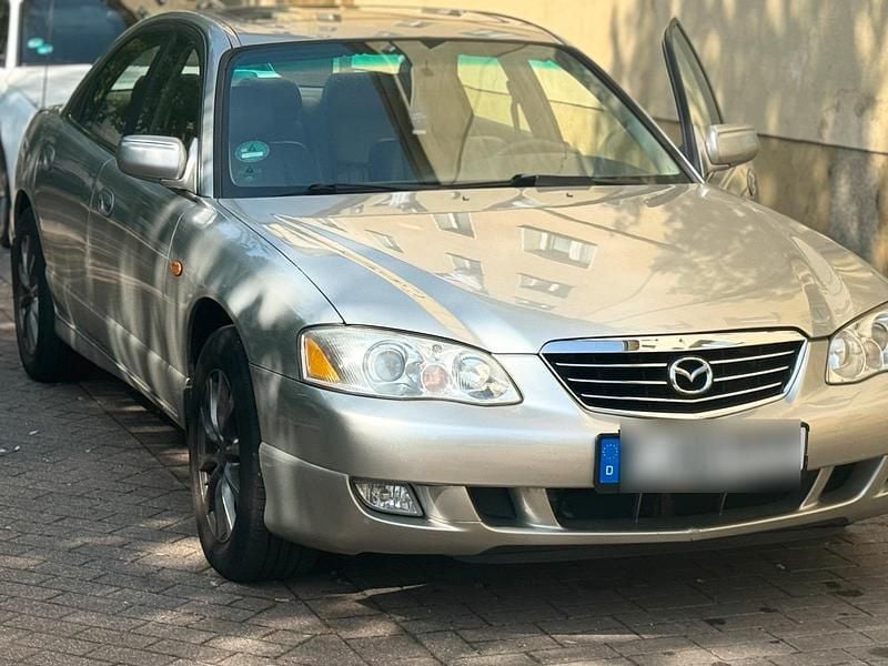 Grau Gebraucht 2001 Mazda Xedos Limousine | 2.650 € - Bild 1/4