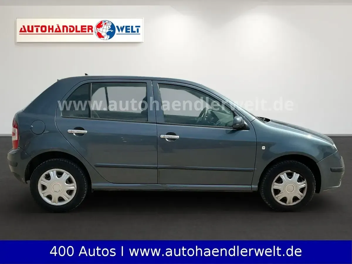 Używany Skoda Fabia 75 KM (55 kW) 2007 Szary Sedan/Limuzyna