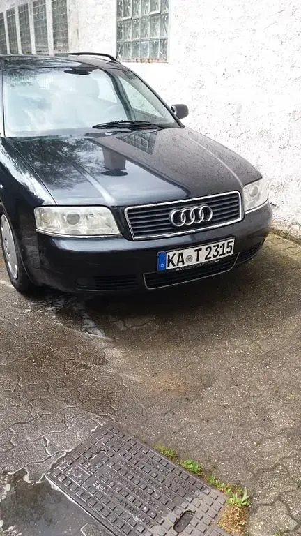 Używany Audi A6 131 KM (96 kW) 2003 Czarny Kombi