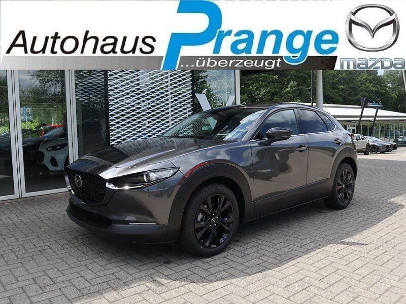 Machine gray Neu 2024 Mazda CX-30 Homura-Line SUV | 28.885 € - Bild 1/4