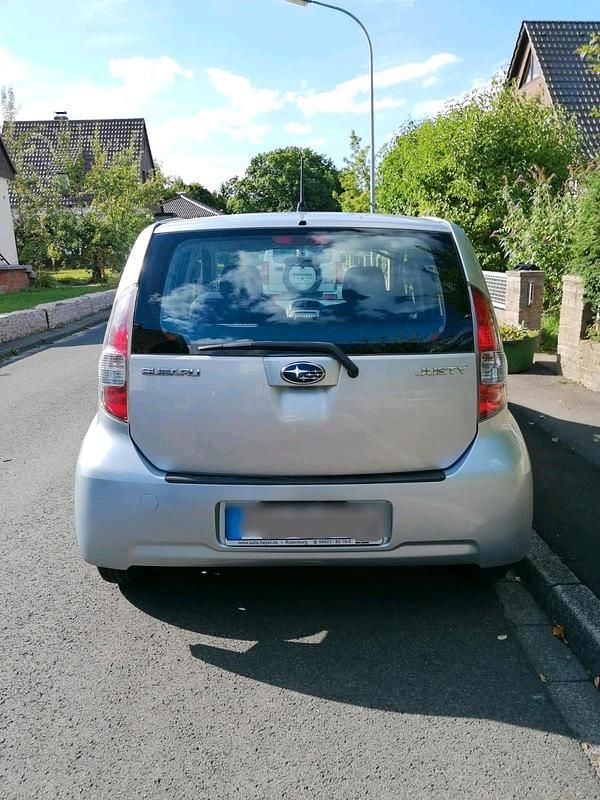 Silber Gebraucht 2006 Subaru Justy Kleinwagen | 1.000 € - Bild 1/4
