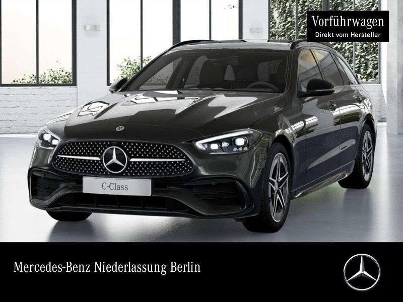 Graphitgrau Gebraucht 2024 Mercedes C300e AMG Kombi | 53.880 € - Bild 1/4