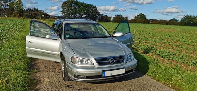 Gebraucht Opel Omega Edition 120 PS (88 kW) 2002 Silber metallic Kombi