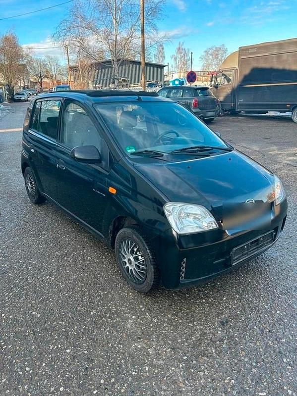 Gebraucht Daihatsu Cuore 58 PS (42 kW) 2004 Schwarz Kleinwagen
