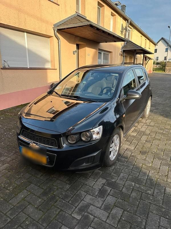 Gebraucht Chevrolet Aveo 101 PS (74 kW) 2012 Schwarz Kleinwagen