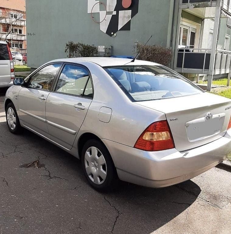 Grau Gebraucht 2004 Toyota Corolla Limousine | 3.500 € (Fairer Preis) - Bild 1/4