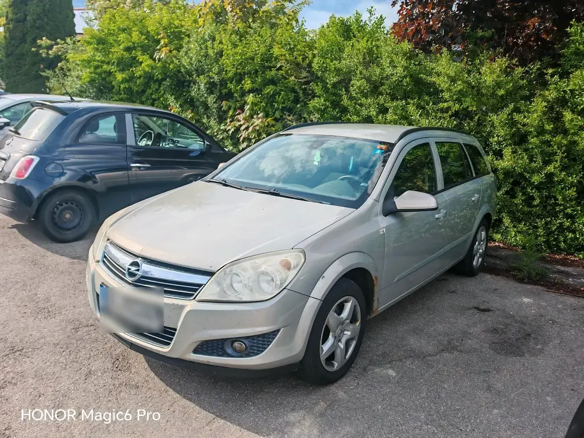 Używany Opel Astra 100 KM (73 kW) 2007 Szary Kombi