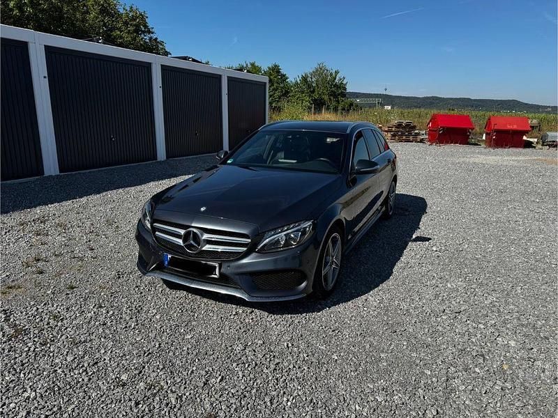 Schwarz Gebraucht 2014 Mercedes C220 AMG line Limousine | 15.400 € (Fairer Preis) - Bild 1/4