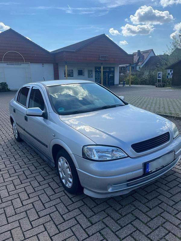Second-hand Opel Astra 101 CP (74 kW) 2002 Argintiu Coupe